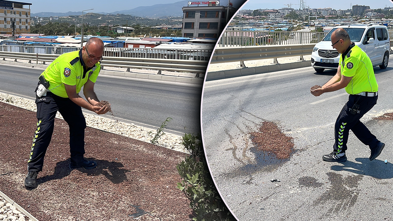 Polisten takdir toplayan hareket! Yağ dökülen yola avuçla kum taşıdı